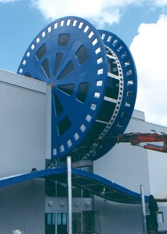 Giant fibreglass film reel manufactured by FDL for the Village 8 cinema in New Lynn, Auckland