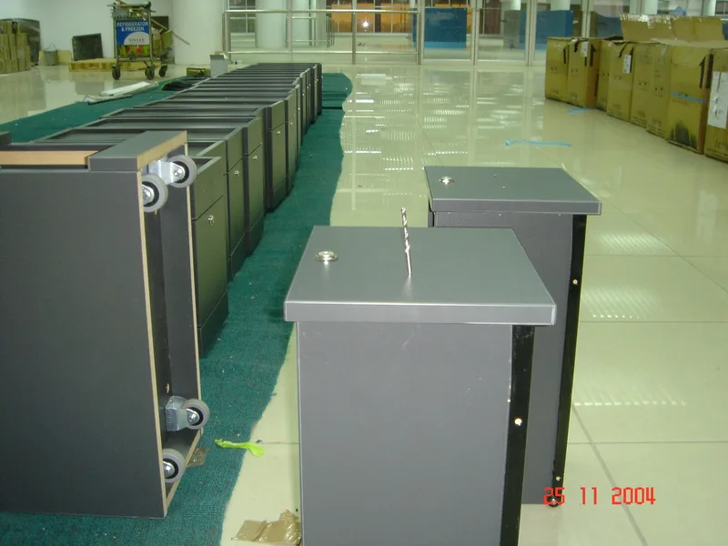 Grey fibreglass podiums – airport information and service counter fabrication